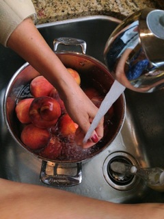 Rinse your peaches. 
